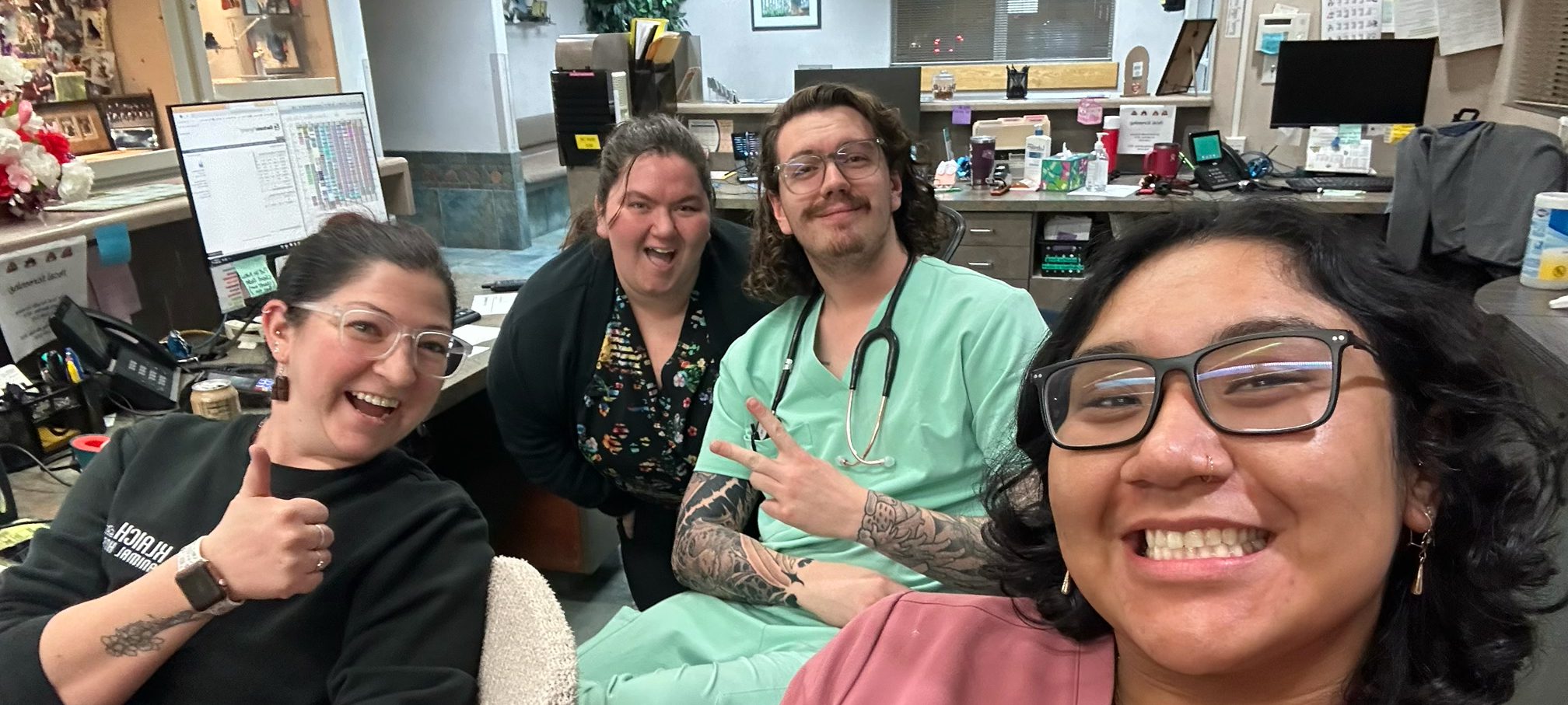 Friendly team at a Reno pet hospital smiling together at Klaich Animal Hospital
